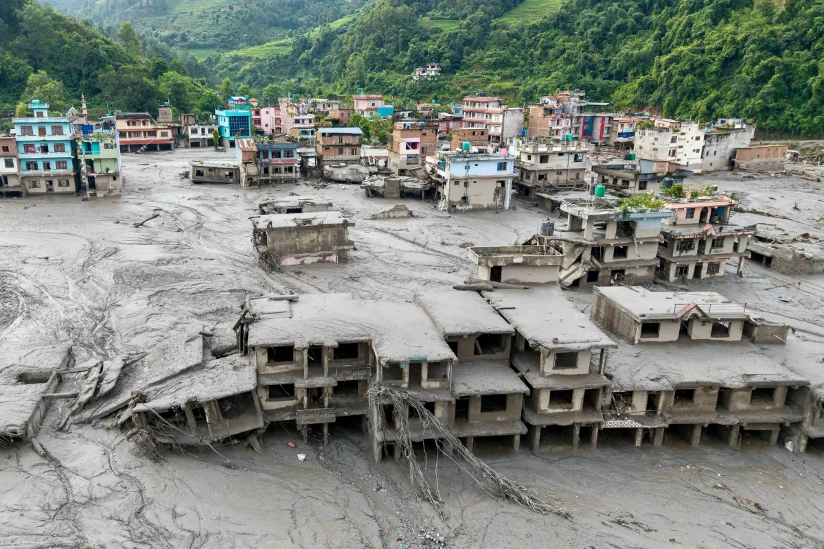 Image 5: Homes have been destroyed by mud and flood water (Prabin RANABHAT / AFP via Getty Images)