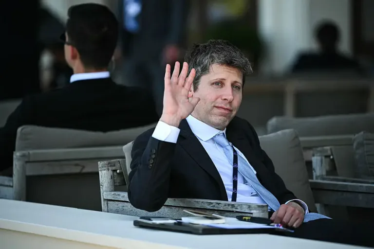 Image 5: Sam Altman wrote a lengthy post about AI (Photo by Mandel NGAN / AFP via Getty Images)
