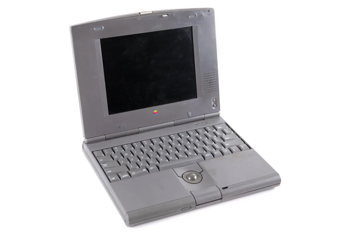 An Apple PowerBook Duo laptop on a white background.