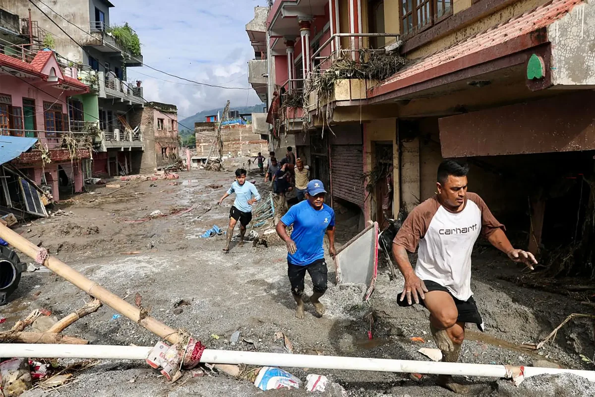 Image 4: Flash floods have wrecked havoc on communities in Nepal (Prabin RANABHAT / AFP via Getty Images)