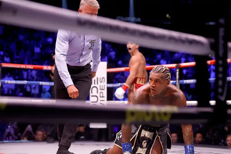 Image 7: Garcia knocked Benn down in the second round, though Benn beat the count (Steve Marcus/Getty Images)