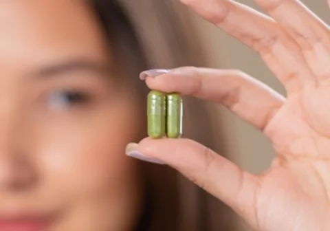 woman holding supplements Supplements are easy to get, but how effective they are for treating depression is unclear. (Stel Antic/corelens/Getty Images)