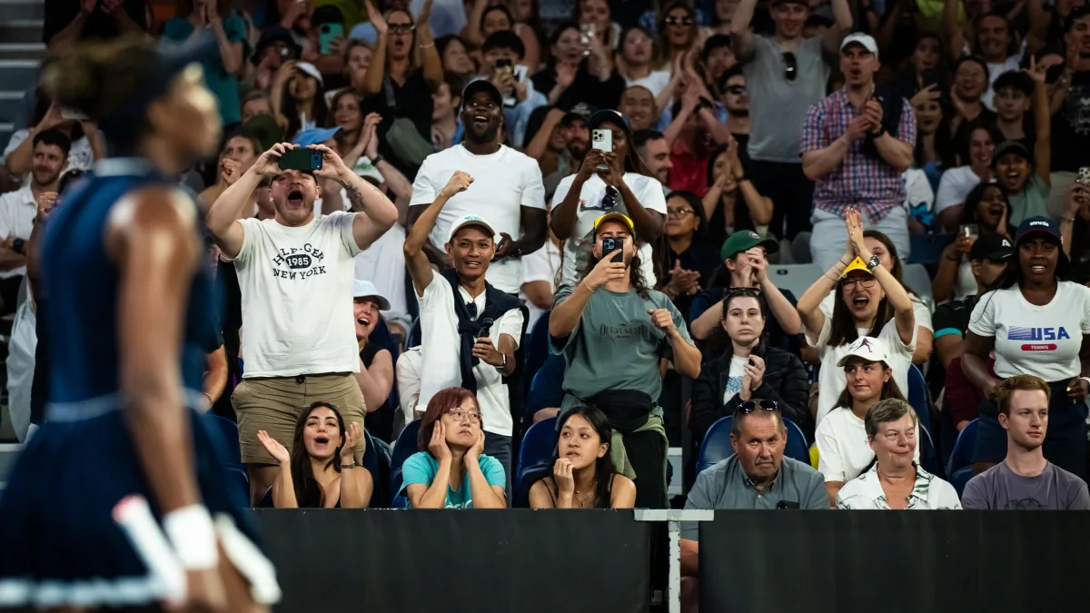 Image 2: Venus Williams is cheered on by fans at January's Australian Open