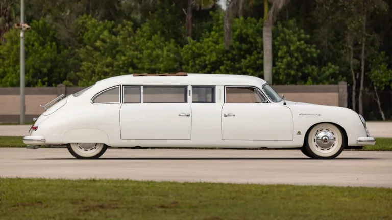 side view, white limousine parked on paved surface with palm trees in background. side view, white limousine parked on paved surface with palm trees in background.