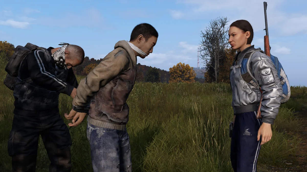 Image 28: Two bandits capturing a player.