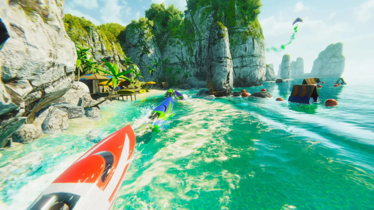 Image 28: A couple of speedboats speed through a tropical landscape