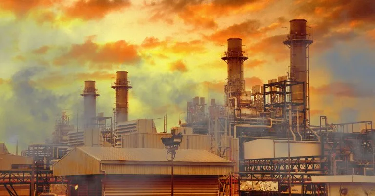 Image 10: A photo illustration of a gas power station generating pollution.