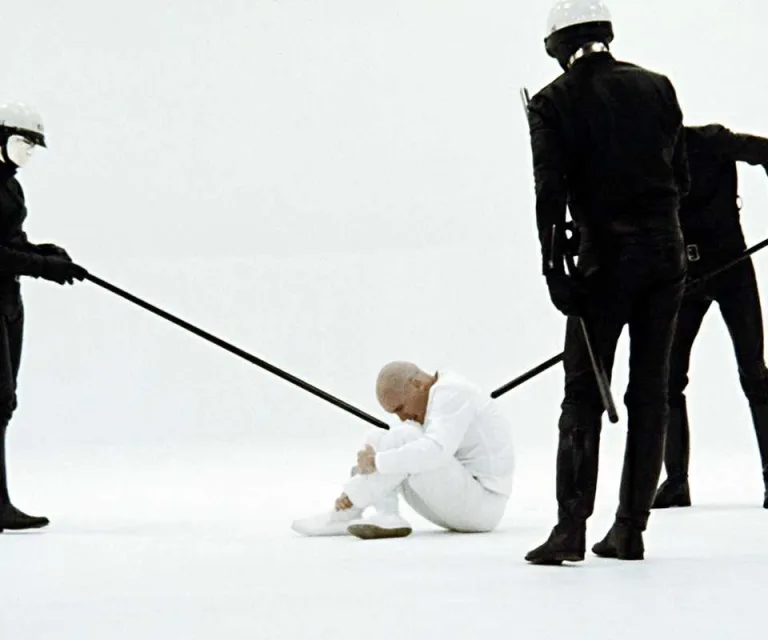 The titular character being probed by police androids in THX 1138