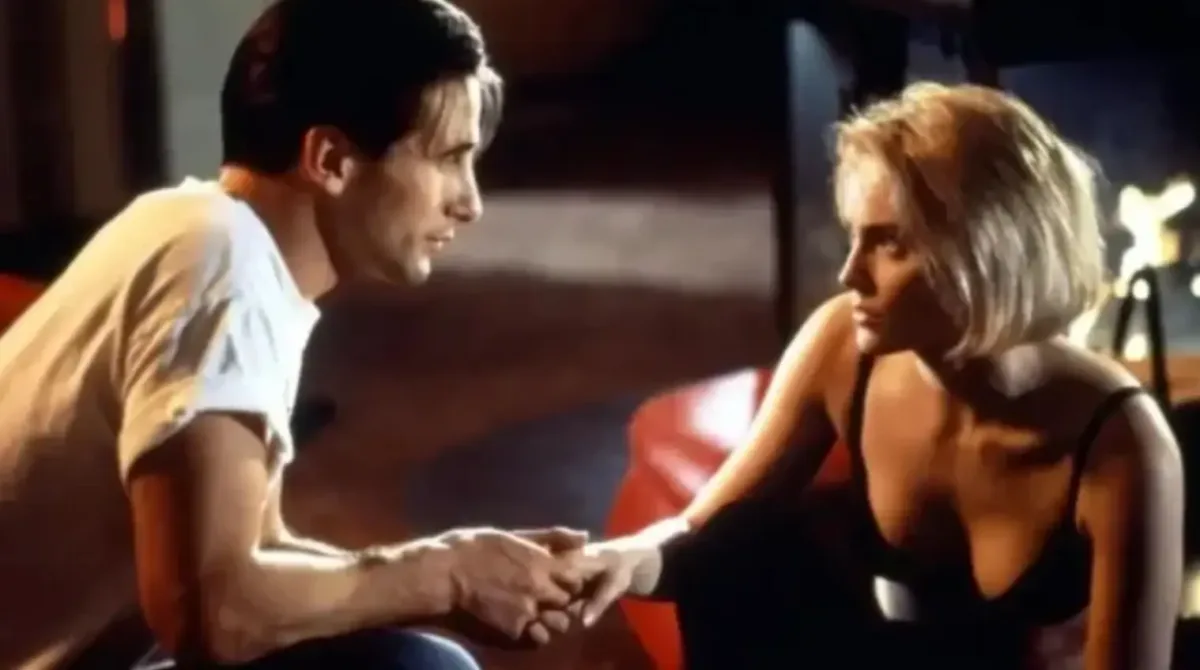 Image 5: Billy Baldwin and Sharon Stone starred alongside one another in the 1993 romance film Sliver (Paramount Pictures)