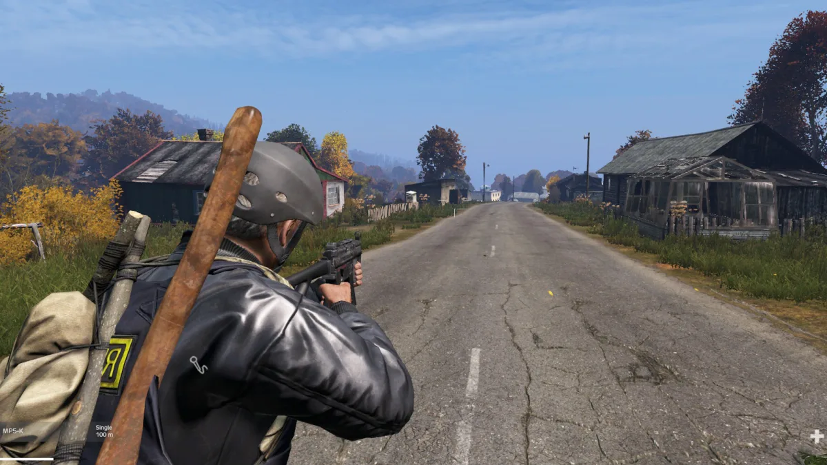 Image 32: A DayZ survivor aiming his gun.