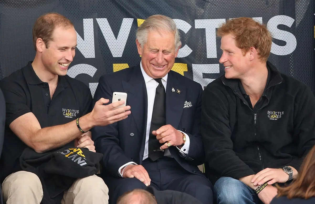 Image 6: The King with his two sons at the 2014 Games
