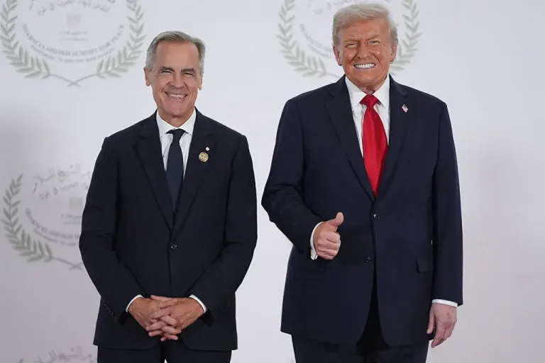 Image 5: Things are far from all smiles between Mark Carney and Donald Trump (EVAN VUCCI/POOL/AFP via Getty Images)