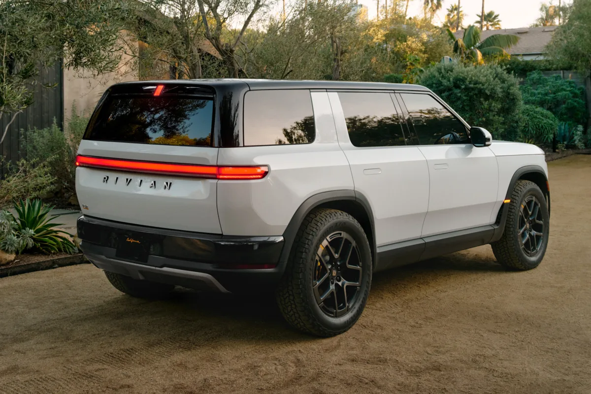 Rivian R2 in white, rear three-quarter view The Rivian R2. Pet Cam relies on its color cabin camera. Source: Rivian